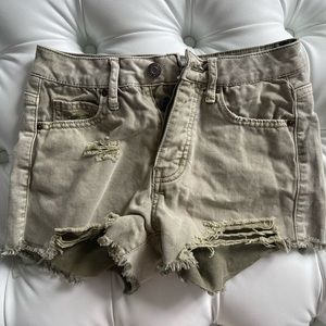 RSQ vintage high rise, a washed out sage color fringe.